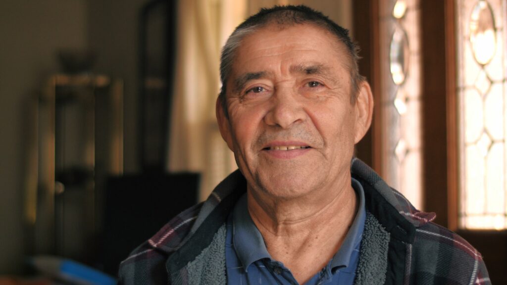 Happy smiling healthy young looking senior man portrait