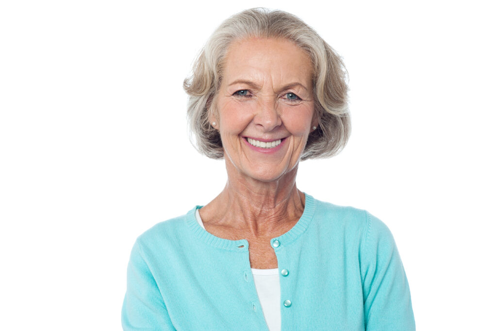Woman in blue shawl smiling