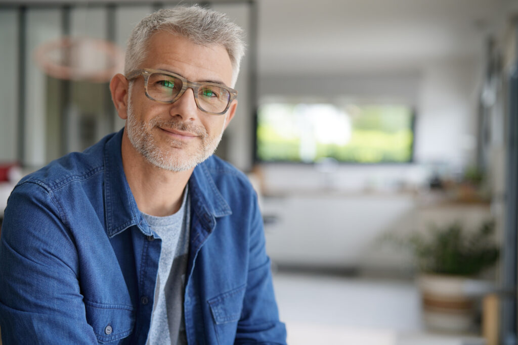 Middle-aged guy with eyeglasses and blue shirt