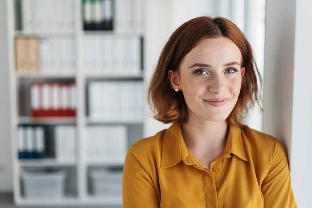 young woman in yellow shirt