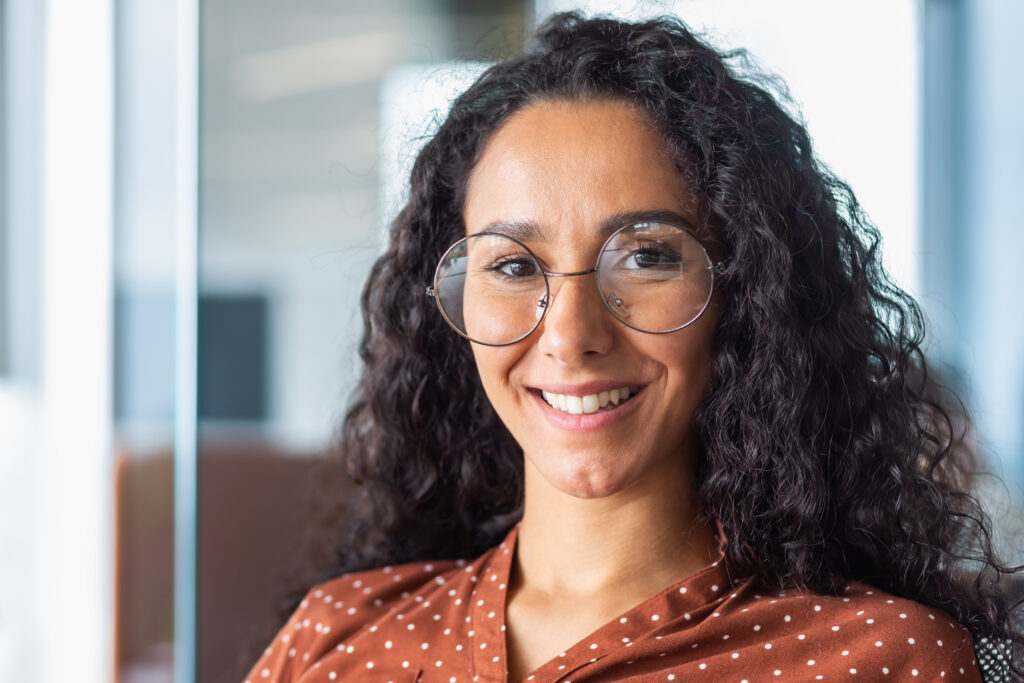 Woman in glasses smiling