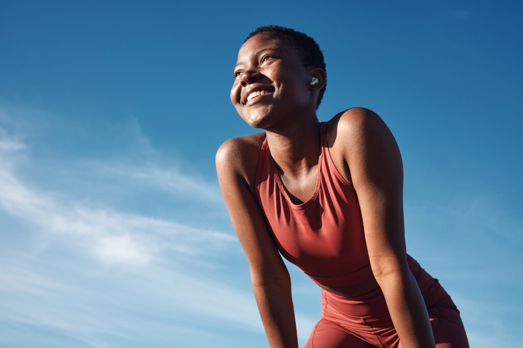 Smiling woman in athletic clothes