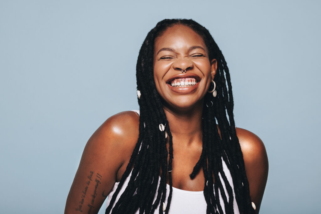 Woman with nose piercing smiling