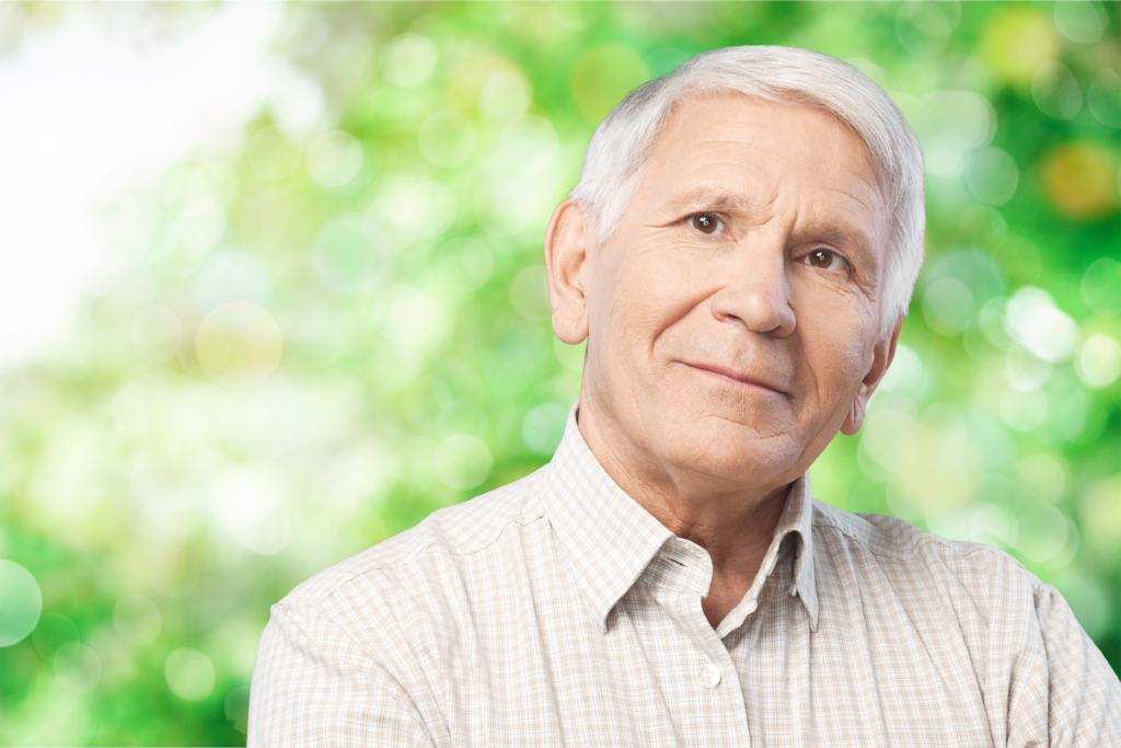 Older man on green background