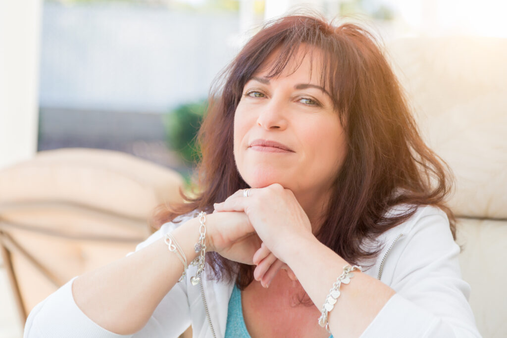 Woman Smiles On The Patio